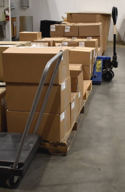 Row of boxes ready for shipment.